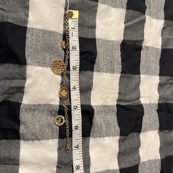 Michael Kors gold flip glitz 4 charms bracelet. - Picture 8 of 8